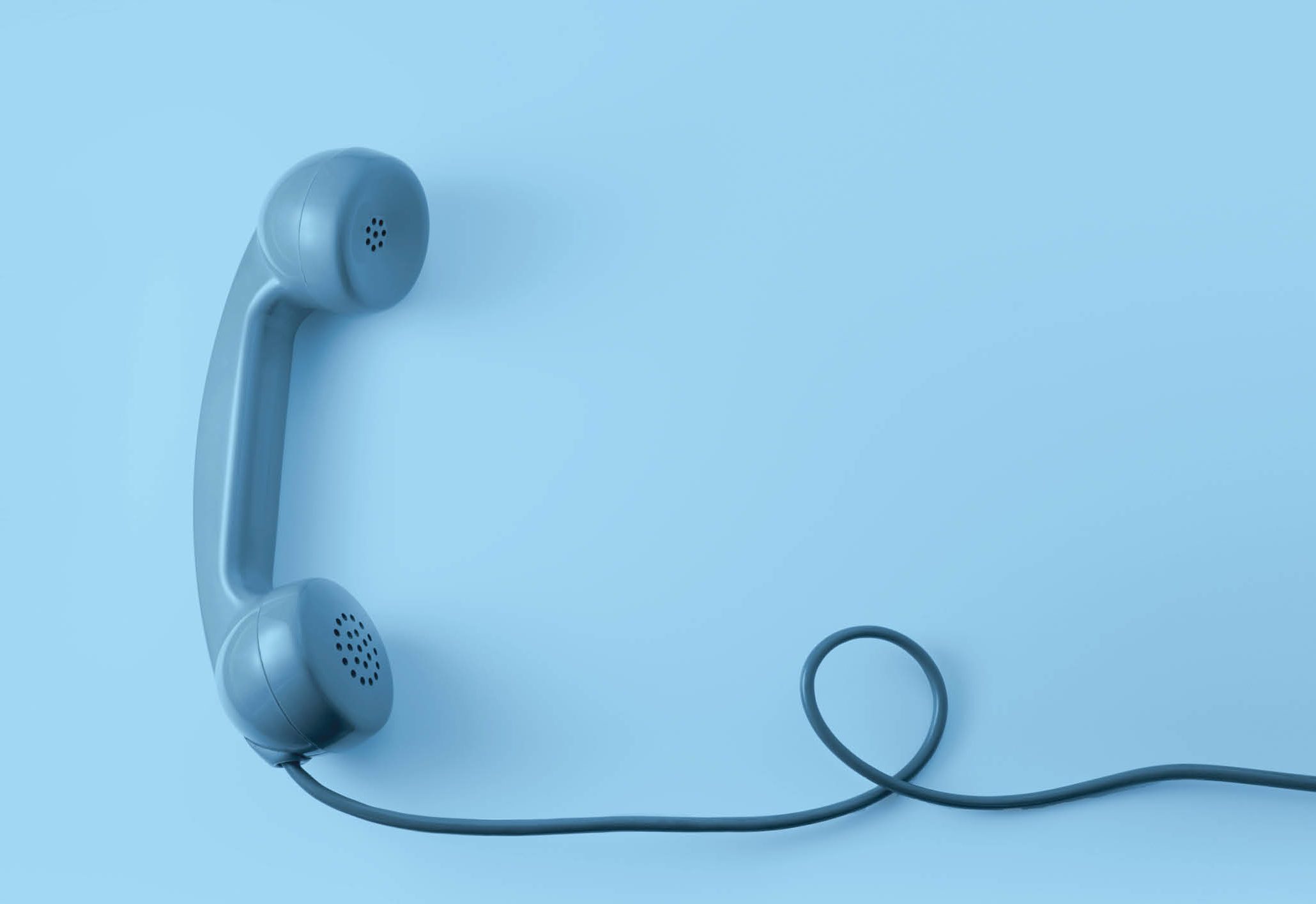 Blå telefon med sladd mot blå bakgrund, symbol för kontakt med TIA Stockholm.